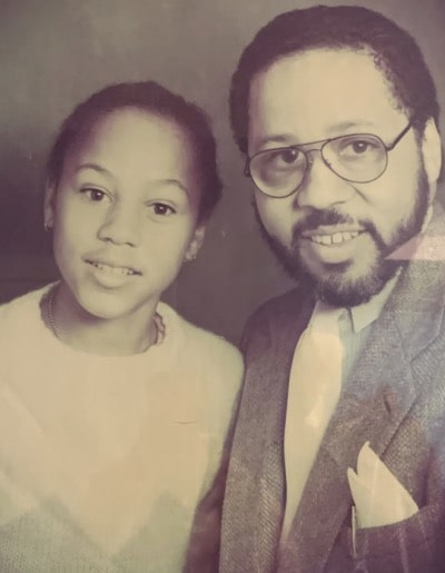 Fani Willis and Father John C. Floyd III in a photo